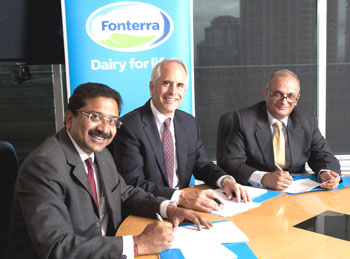 Fonterra CEO Andrew Ferrier, IFFCO Joint Managing Director Rakesh Kapur, and Global Dairy Health (GDH) Director Paresh Chaudhry signing the agreement
