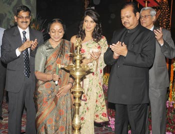 The Speaker, Lok Sabha, Mrs Meira Kumar, lighting the lamp at the presentation of National Tourism Awards, in New Delhi on March 28, 2011. The Union Tourism Minister, Mr Subodh Kant Sahay, and actress Priyanka Chopra is also seen.