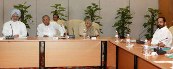 Prime Minister Manmohan Singh, Urban Development Minister S. Jaipal Reddy, Delhi Chief Minister Sheila Dikshit and IOA president Suresh Kalmadi at a meeting to review the preparations for the Commonwealth Games in New Delhi on Saturday.