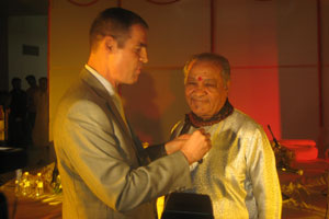The Ambassador of France to India, Mr Jérôme Bonnafont, conferring the distinction of Chevalier dans l'Ordre des Arts et des Lettres on Classical flute exponent Pandit Hariprasad Chaurasia